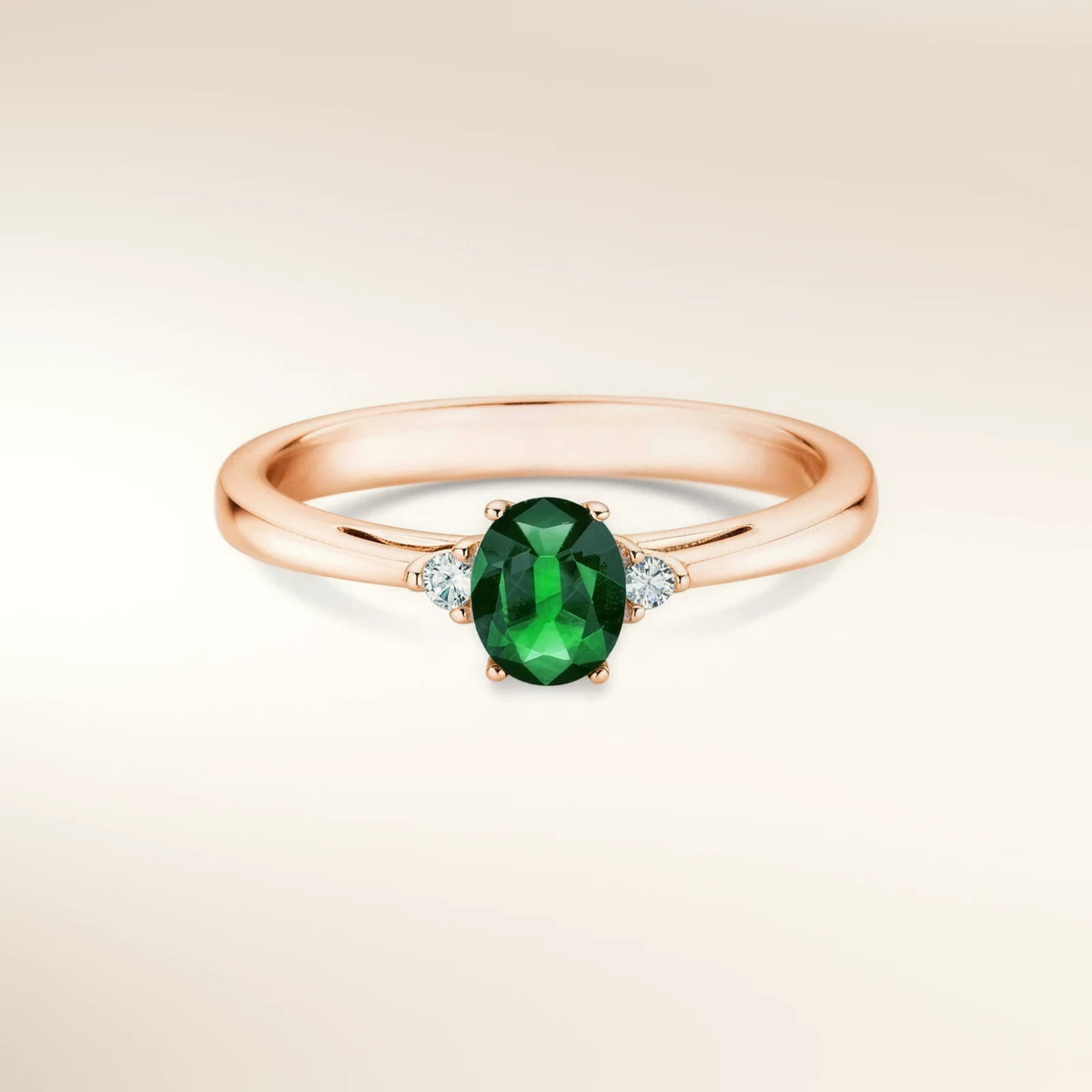 Verlobungsring LIFE Roségold 585, ovaler Smaragd mit zwei Diamanten – Trauringmacher München & Freising