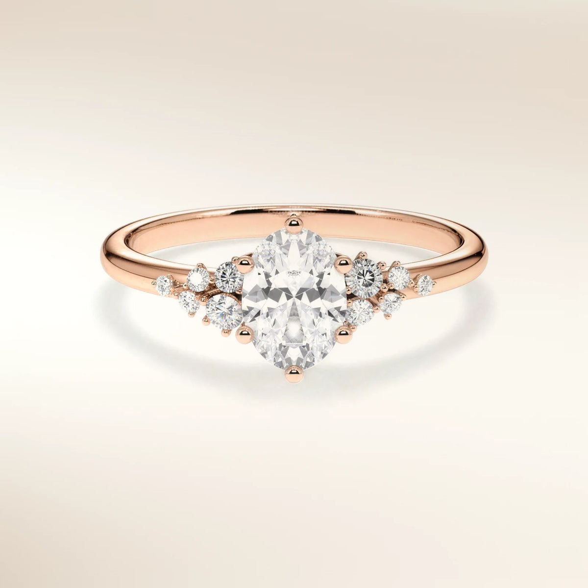 Verlobungsring MIRA OVAL Roségold 585, ovaler Diamant mit Seitendiamanten – Trauringmacher München & Freising